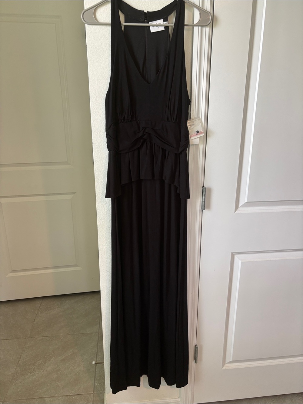 Sleek Black Sleeveless Maxi Dress with Peplum Detail